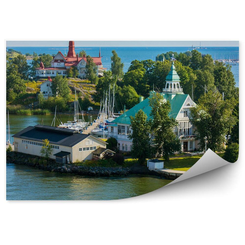 Samolepící fototapeta Skály zelené Faerské ostrovy oceán obloha mraky