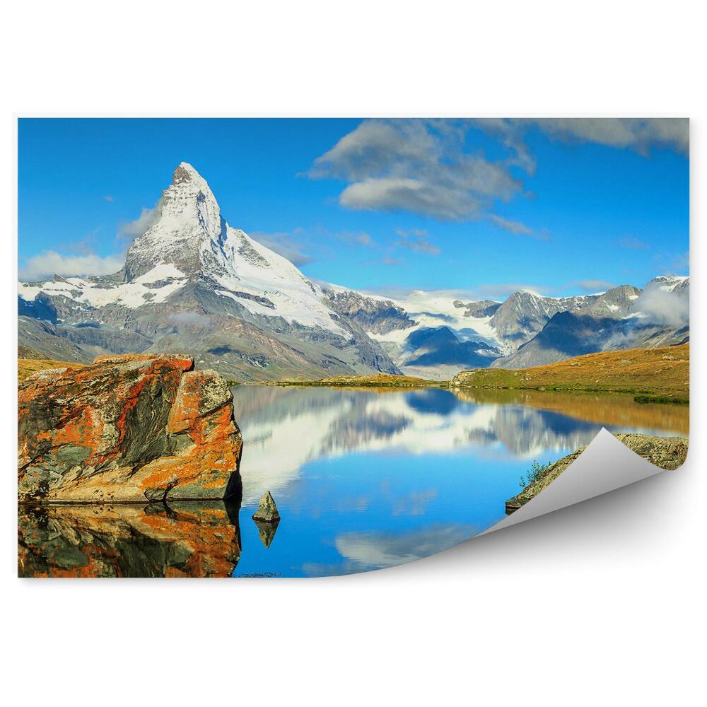 Fototapeta Hory skály sníh oceán nebe mraky