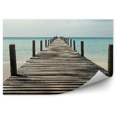 Samolepící fototapeta Starý most řeka květiny muškáty stromy rostliny keře