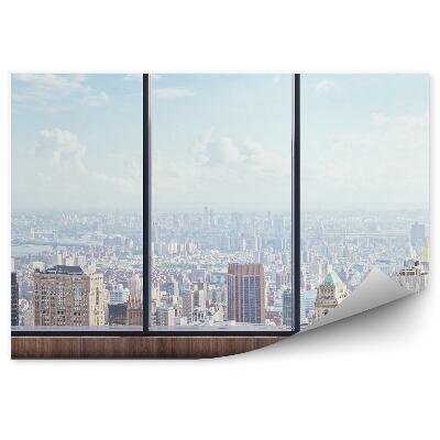 Fototapeta Pohled na město z vrchu za oknem