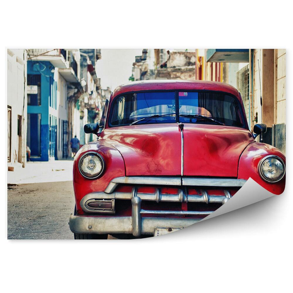 Samolepící fototapeta Historický červený automobil zaparkovaný na ulici