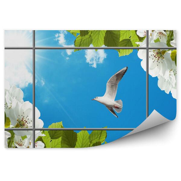 Fototapeta na zeď Bílý pták kvetoucí strom modrá obloha