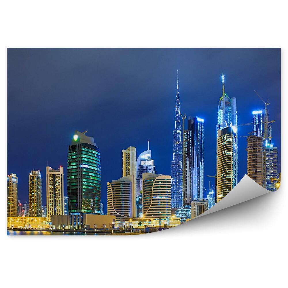 Samolepící fototapeta Mrakodrapy oceán moře budovy noční světlo