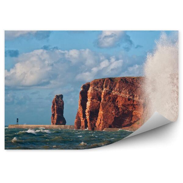 Samolepící fototapeta Oceánský vlnolam skály obloha mraky