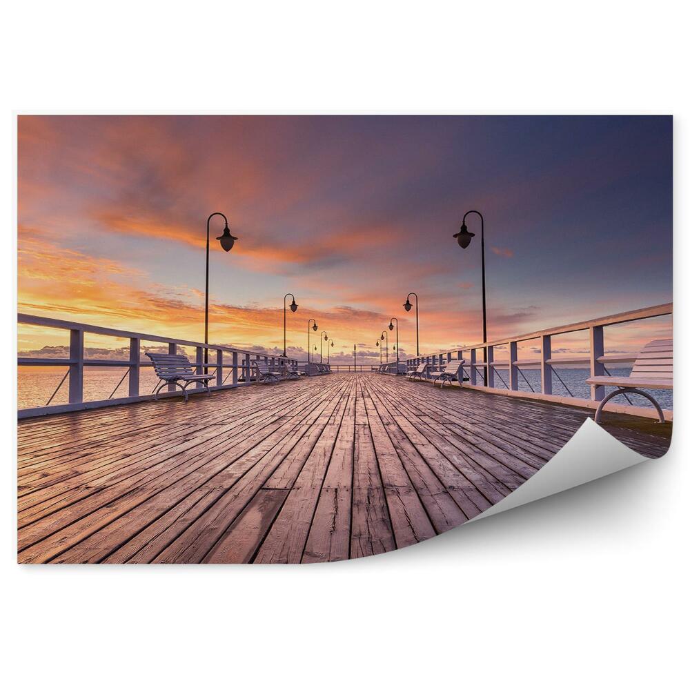 Fototapeta na zeď Zatažená obloha zapadající slunce molo