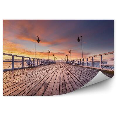 Fototapeta na zeď Zatažená obloha zapadající slunce molo