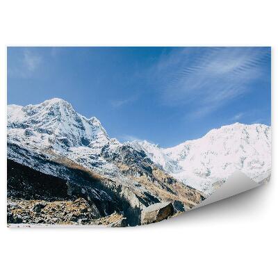 Samolepící fototapeta Sníh na úpatí hory Himálaj modrá obloha