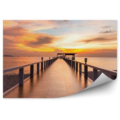 Samolepící fototapeta Pláž molo s východem slunce
