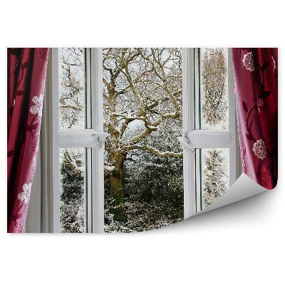 Samolepící fototapeta Otevřená okenní záclona a zasněžené stromy