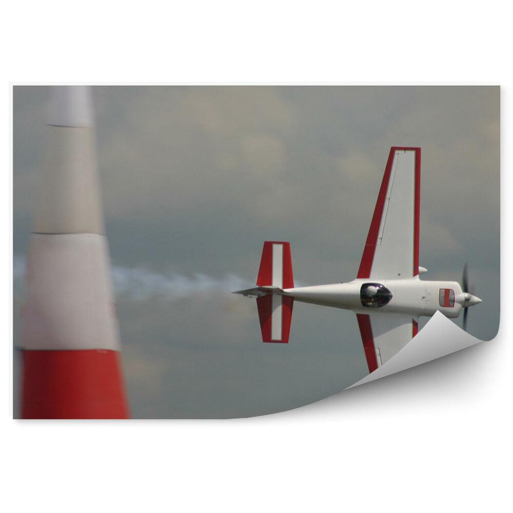 Fototapeta Letadlo letící bokem zatažená obloha