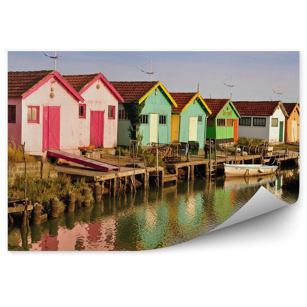 Fototapeta Barevné budovy loď most jezero obloha mraky