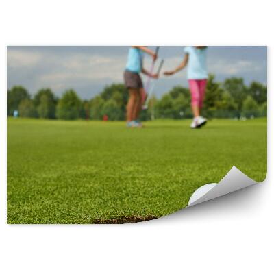 Samolepící fototapeta Dírka golfový míček dětský vozík mraky oblohy stromy