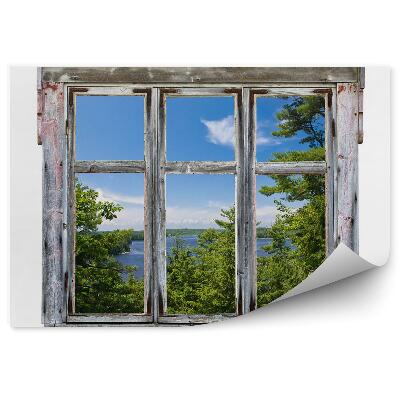 Samolepící fototapeta Malebný pohled skrz rám starého okna