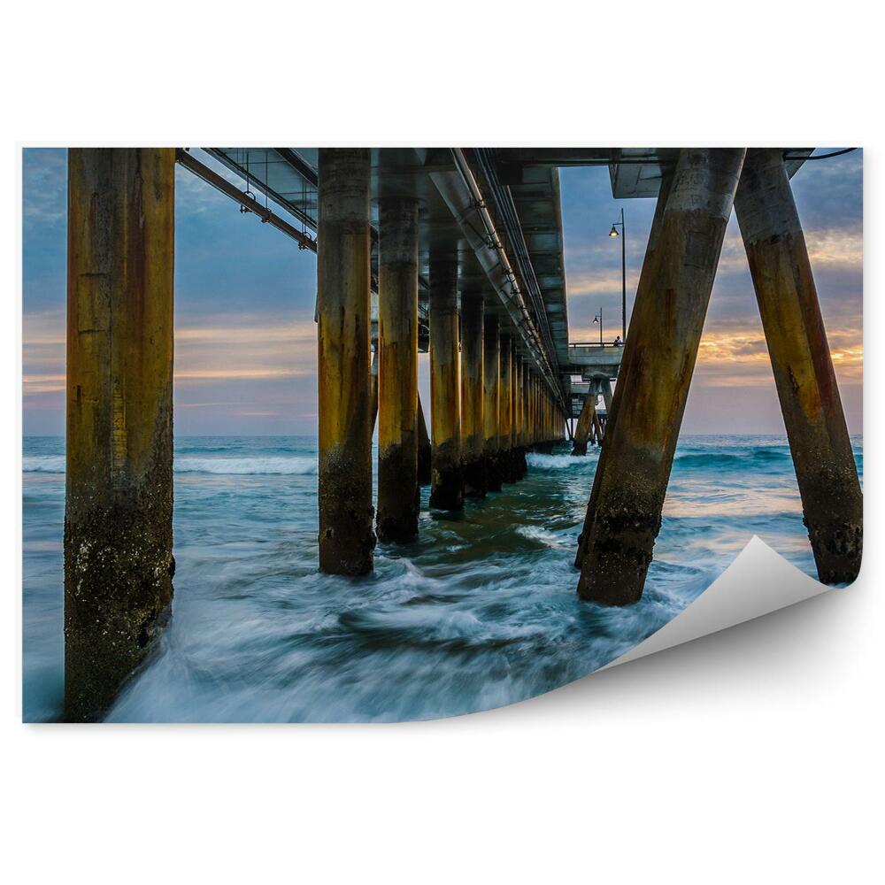 Samolepící fototapeta Oceán vlny západ slunce molo