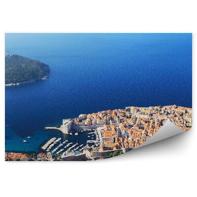 Samolepící fototapeta Panorama starého města Dubrovník budovy lodě zelený ostrov oceán