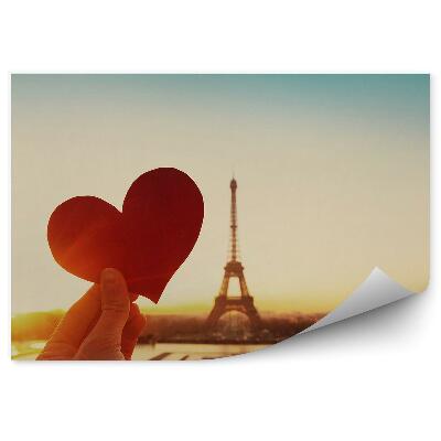 Fototapeta Milostné srdce vystřižené z papíru na pozadí Eiffelovy věže