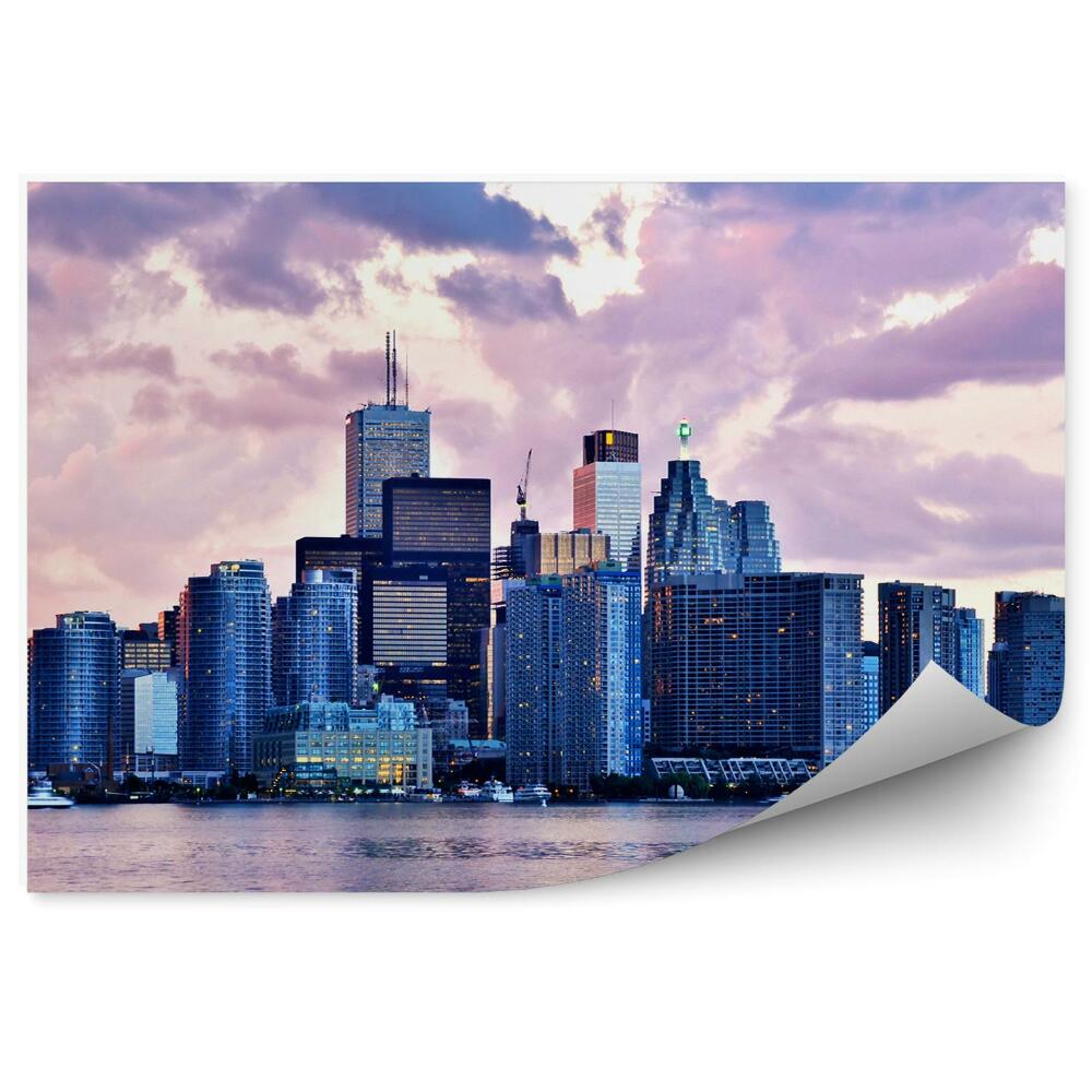 Fototapeta Pohled na městské budovy v růžovém světle