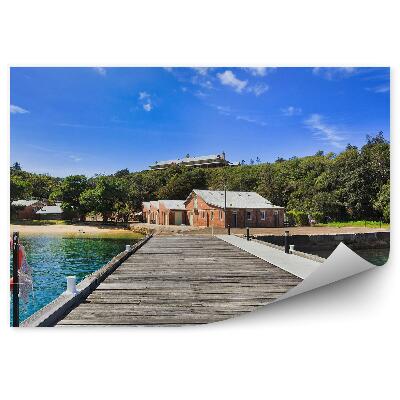 Samolepící fototapeta Černobílé molo oceán pláž kameny lucerny