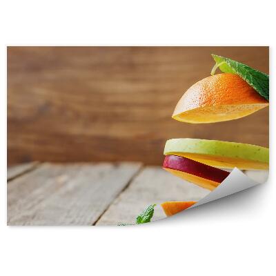 Samolepící fototapeta Létající plátky ovoce jablko hruška pomeranč