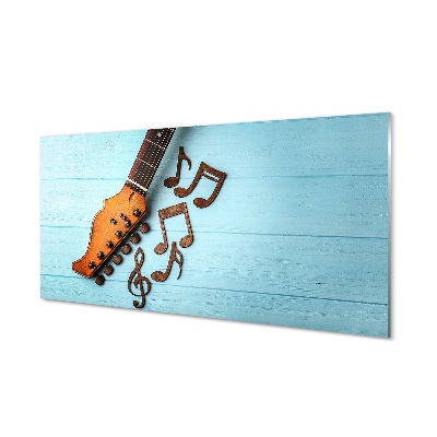 Obraz ze skla Kytarové noty na modrém pozadí