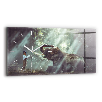 Horizontální skleněné hodiny nástěnné Chlapec si čte knihu