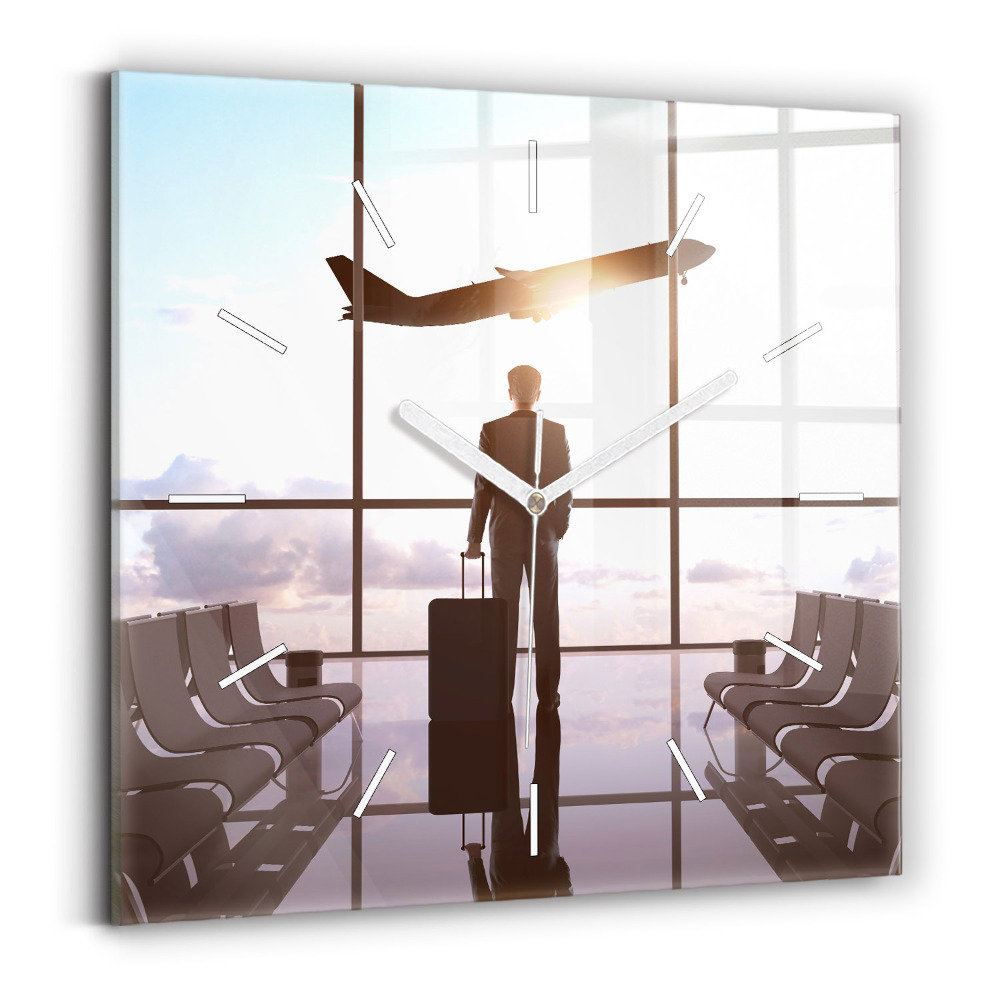 Skleněné nástěnné hodiny čtvercové Muž na letišti
